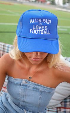 All is fair in love & football, right? This bright blue embroidered trucker hat is perfect for the football fan to rock on game day (and any other day)! 

ALL HATS ARE FINAL SALE! Cheap Trucker Hat For Sports Fans, Cheap Collegiate Trucker Hat For Sports, Fun Blue Trucker Hat With Letter Print, Blue Trucker Hat With Letter Print, Casual Blue Hat For Game Day, Casual Blue Trucker Hat For Game Day, Cool Trucker Hats, Adjustable Blue Trucker Hat For Fans, Blue Hat For Baseball Game Day