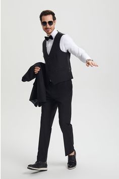 This one button tuxedo by Stacy Adams features a wide black satin shawl lapel, matching pants and vest. This comes in a hybrid fit (Sizes 34-44 = Slim Fit | Sizes 46+ = Modern Fit) Elegant Black Single-breasted Tuxedo, Black Single Breasted Tuxedo For Formal Occasions, Tailored Black Three-piece Tuxedo Suit, Black Tailored Three-piece Tuxedo Suit, Formal Black Single Breasted Tuxedo, Elegant Black Single-breasted Three-piece Suit, Classic Black Three-piece Suit For Black-tie Events, Black Tuxedo Three-piece Suit, Tailored Tuxedo Vest For Business