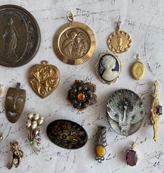 Beautiful Antique French jewelry broches pendants lockets choose your charms from this set of 17, 17 beautiful unique jewelry piece pendants medailles broches locket charm ornamental art nouveau french german spanish italian dutch, choose your charms by numer from the drop-down menu, the numbers are on the photo's! Worldwide shipping within two weeks Antique Jeweled Brooches For Gifts, Antique Brooches With Vintage Charm As Gift, Antique Brooches With Vintage Charm For Gifts, Heirloom Pendant Brooches As Gifts, Unique Pendant Jewelry For Collecting, Antique Jeweled Pendant Brooches, Gold Jeweled Pendant Brooches, Gold Pendant Brooches With Jewels, Gold Pendant Brooch With Jewels