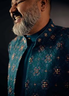 Editor's Note Featuring Floral Jamawar Embroidered Teal Green Open Sherwani Set With Dabka Highlighting. Paired With Matching Angrakha Kurta And Tapered Trousers. Fabric: Linen Silk Color: Teal Green Component: Sherwani, Kurta, Trousers Care: Dry Clean Only About the Designer After establishing himself as the leading couturier in the industry of menswear, Jatin Malik went on to explore luxury footwear. You can order online these amazingly designed handmade shoes that are being offered in classy Green Bandhgala With Naqshi For Festivals, Festive Green Bandhgala With Naqshi Detailing, Festive Green Bandhgala With Naqshi, Green Straight Kurta Bandhgala With Dabka Details, Green Straight Kurta Bandhgala With Dabka, Green Sherwani With Naqshi For Eid, Ceremonial Green Traditional Wear With Naqshi, Green Naqshi Sherwani For Eid, Green Naqshi Sherwani For Diwali