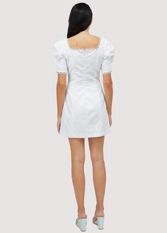 Get ready to make a statement in our Majorca Breeze Mini Dress. Made with a fresh white linen blend, this dress exudes femininity and romance with its delicate puff sleeves and scallop trim details. Perfect for a chic summer look that will turn heads. WDWH13246 Imported 45% Viscose 24% Polyester 20% Linen 11% Cotton Model is 5 ft 9.5 inches; Bust: 32", Waist: 24", Hips: 34" and wearing a size Small Runs true to size Hand wash or wash with gentle cycle with cold water with like colors, Air dry to Feminine Puff Sleeve Dress With Lace Trim, Fitted Puff Sleeve Mini Dress With Lace Trim, Feminine Fitted Puff Sleeve Dress With Lace Trim, Summer Puff Sleeve Dress With Lace Trim, Feminine Spring Mini Dress With Scalloped Edges, Elegant Dresses With Scalloped Edges For Daywear, Elegant Scalloped Edge Day Dresses, Puff Sleeve Mini Dress With Lace Trim For Brunch, Feminine Puff Sleeve Dress With Lace Trim For Brunch