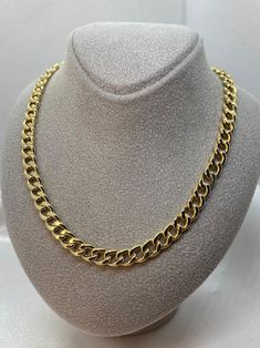 "18K Miami Style Cuban chain to complete your jewelry collection. Perfect to wear alone or with your favorite charms. Metal: Gold Color: Yellow Style: Cuban (Curb) Closure: Spring ring Style: Minimalist Purity: 18K Solid Gold (stamped for authenticity) 18k Gold Cuban Link necklace~ 24 gr , 26 inches, 6.8 Arrives in a GIFT BOX and includes FREE SHIPPING within the USA and Canada. Shop with confidence knowing that the items you purchase here are always 100% Authentic 14K or 18K Solid Gold.You are always guaranteed WHOLESALE PRICES in this shop. . Make sure to hit \"favorite\" button on the right so it remains on your favorites list and/ or add to your wishlist(s). FOLLOW US ON SOCIAL MEDIA + Follow us on Instagram!  https://www.instagram.com/pomegranatejewelry/ + Like us on Facebook!  https: Men Gold Chain, Necklace For Men Gold, Gold Chain Women, Miami Style, Gold Cuban Link Chain, Cuban Link Necklace, Yellow Style, Cuban Link Chain Necklaces, Chain Women