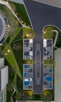 an aerial view of the parking lot and surrounding buildings