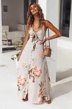 We're really into maxis at the moment and our Sounds Of Summer Maxi Dress has our hearts racing! This style has a tie front bust, adjustable shoulder straps and it buttons down the front. This style looks street style chic when layered over a white tee and paired with slides - our FAVES are the Dayla slides from BILLINI. Beige dress. Partially lined. Cold hand wash only. Model is a standard XS and is wearing XS. True to size. Non stretchy fabric. No zipper, button up style. Print placement may vary. Polyester. Button Dresses For Women, Spring Brunch Maxi Dress With Adjustable Straps, Spring Maxi Dress With Tie Waist For Day Out, Spring Maxi Dress With Adjustable Straps For Brunch, V-neck Maxi Dress With Tie Straps For Day Out, Spring Maxi Dress With Tie Fastening For Brunch, Casual Spring Dress With Knotted Straps, Spring Maxi Dress With Tie Straps For Day Out, Spring Maxi Dress With Knotted Straps For Day Out