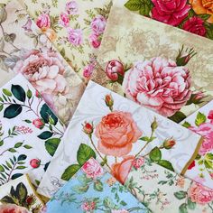 many different types of flowers are on the tablecloths and there is no image here to provide a caption for