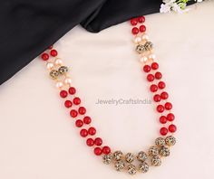 Red Beads Long Victorian Necklace/ Indian Jewelry/ Indian Necklace/ Indian Wedding/ Kundan Necklace/ Kundan Jewelry/ Sabyasachi Jewelry / Kundan long necklace / indian long necklace / indian long pearl necklace High Quality and Craftsmanship All the raw material used in this product is of high quality and is handcrafted with love . Necklace Length: 12 inches Gifting : This necklace and earrings come in  a beautiful gift box , making it an ideal gift for birthday , wedding anniversary or wedding Red Round Beads Pearl Necklace For Wedding, Red Pearl Necklace Temple Jewelry For Festivals, Red Pearl Necklace With Round Beads For Wedding, Red Pearl Temple Jewelry Necklace For Festivals, Red Temple Jewelry Pearl Necklace For Festivals, Red Pearl Necklace For Wedding, Red Bridal Necklace With Round Beads For Festivals, Red Round Beads Bridal Necklace For Party, Red Pearl Necklace For Festive Gift