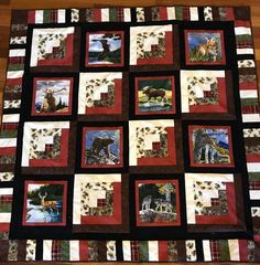 a quilt with pictures of animals on it