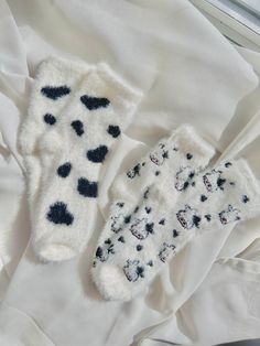 "\"Cozy Fuzzy Cow Socks, Unisex Cow Socks, Cow Print Socks, Fluffy Socks, Novelty Socks, Gift Cute Soft Socks, Fun Thickened Sleeping Socks\" Slip into a world of cozy comfort with our moo-tiful cow printed socks! Let your feet experience the fluffy goodness of walking on clouds. Whether it's for a special occasion or just a little self-indulgence, these socks are the perfect fit. Feeling festive and looking for some fuzzy fun this holiday season? We have the perfect solution! Grab both pairs at an udderly fantastic price. You can choose between our cute cow face print or our classic cow print design. Happy feet guaranteed! NOTE: Colors displayed may vary slightly depending on your screen. ~DETAILS: Measurements: One size fits all, US 5-9 Material: 100% Polyester. ~CARE INSTRUCTIONS: -When Cute White Winter Stockings, Cute White Stockings For Winter, Comfortable Warm White Knee-high Socks, White Winter Gift Socks, White Winter Socks As Gift, White Socks For Winter Gifts, Cozy White Socks For Gifts, Cozy White Socks As Gift, Cozy White Socks As A Gift