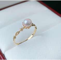 Vintage Style Japanese Akoya Pearl and Diamond Ring, Ivory Pinkish Color Pearls, Akoya Fine Pearl Solitaire Ring, Dainty Everyday Gold Rings ✦PRODUCT DETAILS✦ → Main stone: Akoya Pearl 5-5.5mm → Side stone: Diamond 0.02ct ✦SPECIFICATIONS✦ MOISSANITE ✓ COLOR: D ✓ CLARITY: VVS1 ✓ CUT: EXCELLENT OR DIAMOND ✓ COLOR: F-G ✓ CLARITY: SI1-VS ABOUT US ♥ Our designer and craftsmen work to create and deliver the most refined pieces of jewelry to you. We carefully handpicked and sourced each gemstone to ens Pearl Gold Wedding Ring, Gold Rings Pearl, Promise Rings Pearl, White Ring With Elegant Design, Elegant White Round Ring, Heirloom Diamond Pearl Ring For Gift, Heirloom Diamond Pearl Ring As Gift, Pearl White Diamond Rings For Wedding, Elegant White Rings For Marriage