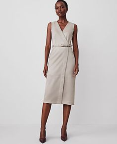 Our belted V-neck sheath makes a statement in rich faux suede. Crossover V-neck. Sleeveless. Self tie buckle belt. Hidden back zipper with hook-and-eye closure. Lined bodice.,Hit:30" from natural waist,Imported:Imported,Fit:Hits below the knee,Fabrication:Shell: 96% Polyester, 4% Spandex; Lining: 100% Polyester,Garment Care:Machine Washable Faux Suede Belted Wrap Sheath Dress by Ann Taylor Size regular - 12 Cliff Grey Women's Sheath, Faux, Leather, Suede, Regular, V-Neck, Sleeveless, Dresses, Sh Fitted Knee-length Linen Dress With Belt, Knee-length Belted Fitted Linen Dress, Fitted Belted V-neck Midi Dress, Belted V-neck Wrap Dress For Work, Linen Belted V-neck Midi Dress, Suede Belt, Wrap Midi Dress, Size 16 Dresses, Grey Women