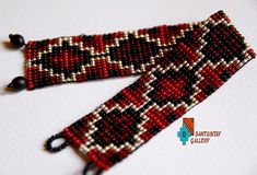 Stunning elegant beaded bracelet. Has been made on the loom from glass czech small beads in red, old gold and black. Dimensions: 19 cm x 3 cm Red Handwoven Beads For Jewelry Making, Traditional Red Friendship Bracelets With Colorful Beads, Handwoven Red Beads For Gifts, Traditional Red Handmade Beaded Bracelets, Bohemian Black Handwoven Beaded Bracelets, Handwoven Black Beaded Bracelets For Festival, Handwoven Black Bracelet Jewelry, Black Handwoven Beaded Bracelets For Festivals, Black Handwoven Jewelry Bracelet