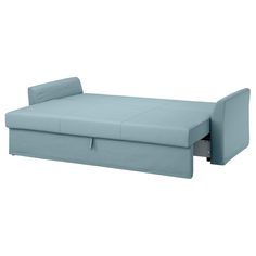 a blue couch with the pull out bed underneath it