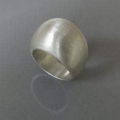 Sterling silver geometric ring, Sculptural ring, Silver statement ring, Chunky silver ring, Bold sil Minimalist Silver Wide Band Ring Gift, Minimalist Silver Ring With Concave Shape, Modern Silver Wide Band Wedding Ring, Elegant Handmade Silver Dome Ring, Handmade Silver Wide Band Ring Minimalist Style, Silver Wide Band Dome Ring As Gift, Modern Sterling Silver Dome Promise Ring, Handmade Silver Minimalist Wide Band Ring, Modern Silver Wide Band Ring For Anniversary