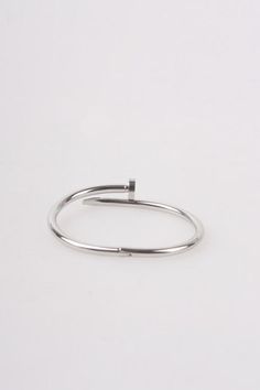 Classic design bracelet that goes well with your outfit. Chic Sterling Silver Bracelets In Silver, Minimalist White Gold Stainless Steel Jewelry, Chic Bangle Bracelets, Chic Bangle Bracelets As Fashion Accessory, Stainless Steel Bracelets With Polished Finish For Gifts, Trendy Sterling Silver Jewelry With Simple Design, Minimalist Silver Stainless Steel Jewelry, Elegant Nickel-free Bracelets As Fashion Accessory, Chic Silver Chain Bracelet For Formal Occasions