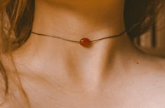 "This is a minimalist cord necklace featuring a single carnelian stone on our brown waterproof cord. This necklace is finished with a backdrop where the cord ends drape down your upper spine and end with a copper embellishment. Fully adjustable with a sliding knot closure and can be worn as tight as a choker or any length of necklace you desire! ✺ SIZE GUIDE ✺ ⌁ This choker is designed with a sliding knot closure and can comfortably adjust to as tight as you need while the maximum length is 24\" Sliding Knot Closure, Dainty Necklaces, Carnelian Necklace, Anchorage Alaska, Cord Ends, Choker Pendant, Dope Jewelry, Jewelry Dainty, Crystal Choker