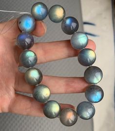 Material:Labradorite beads size :Approx 13mm   quantity: one strand  6mm approx 29 pcs one strands 7mm approx25 pcs one strands 8mm approx 22 pcs one strands 9mm approx 21pcs one strands 10mm approx 19 pcs one strands 11mm approx 18pcs one strands 12mm approx 16 pcs one strands 13mm approx 16 pcs one strands 14mm approx 15 pcs one strands 15mm approx 14pcs one strands 16mm approx 14 pcs one strands 17mm approx 13pcs one strands 18mm approx 13pcs one strands 19mm approx 12pcs one strands 20mm app Handmade Iridescent Jewelry With Round Beads, Handmade Iridescent Round Bead Jewelry, Labradorite Bead Jewelry As A Gift, Moonstone Round Beads Jewelry For Healing, Iridescent 8mm Round Bead Jewelry, Handmade Iridescent Bracelets With Round Beads, Round Beads For Jewelry Making, Handmade Round Beads For Jewelry Making, Moonstone Gemstone Beaded Bracelets With Round Beads