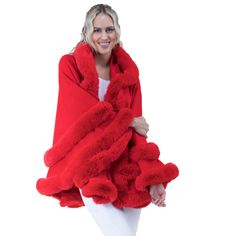 Indulge in the ultimate blend of sophistication and warmth with our faux fur-trimmed cape. This glamorous piece, featuring a plush faux fur trim and a relaxed silhouette, is perfect for elevating your winter wardrobe or adding an extra layer of elegance to any special occasion. Ideal for weddings, evening events, or casual outings, this cape offers versatile styling and unbeatable comfort. Shipping Information: - Ready to ship within 2 days - Fast shipping available upon request - Gift wrapping Faux Fur Trim Outerwear, Solid Color Outerwear With Faux Fur Trim, Winter Faux Fur Coat With Feather Trim, Faux Fur Coat For Cold Weather, Solid Faux Fur Coat For Cold Weather, Solid Color Faux Fur Coat For Winter, Solid Color Faux Fur Coat For Cold Weather, Faux Fur Outerwear With Feather Trim For Cold Weather, Cold Weather Faux Fur Outerwear With Feather Trim