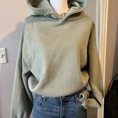 Nwot Sage Green Hoodie From Zara Elastic Waist And Cuffs Size Large Very Soft And Comfy, Lovely Color! Basic Hooded Winter Sweater, Basic Winter Hooded Sweater, Basic Winter Hoodie Sweater, Basic Fall Hoodie, Spring Khaki Hoodie Sweatshirt, Winter Khaki Cotton Sweatshirt, Cozy Solid Color Hoodie For Spring, Oversized Khaki Hooded Hoodie, Basic Fall Hoodie With Ribbed Cuffs