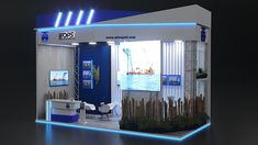 an exhibition booth with blue lighting on the walls