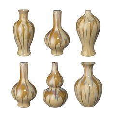 a set of nine vases sitting next to each other