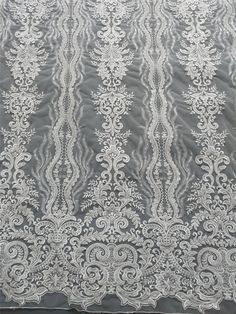 an image of a white lace fabric