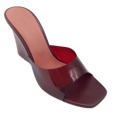 Description: Amina Muaddi Burgundy Lucite Wedge Sandals. Condition: Never Worn *Although These Shoes Are In Brand New Condition, They May Have Minor Scuffs On The Soles Or Exterior Marks From In-Store Try On. Please Refer To Photos. Material: Plastic Includes: N/A Country Of Origin: Italy *Please Note, As With Most Shoes Made In Italy, These May Run Small. Heel Height: 4" Sole: Leather Hardware: N/A Color: Burgundy Size: Us 9.5 / It 39.5 Category: Shoes Subcategory: Sandals Sub Sub Category: San Closed Toe Wedge Sandals With Deep Heel Cup, Luxury Summer Wedge Sandals With Block Heel, Luxury High Heel Wedge Sandals For Summer, Luxury Summer Wedge Sandals With Wrapped Heel, Designer Wedge Sandals For Summer Formal, Designer Summer Wedge Sandals For Formal Occasions, Designer Formal Wedge Sandals For Summer, Party Wedge Slip-on Sandals, Party Slip-on Wedge Sandals