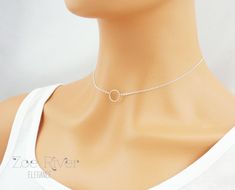 The simple circle symbolizes Eternity and also "Good Karma". It hangs on a short choker style fine chain with a quality spring clasp. Available in silver or rose gold - choose from the drop-down list above.HOW TO ORDER :* Choose colour from the drop-down list above* Choose chain length - The shorter choker lengths are adjustableTIP: measure a necklace you own, from end to end, to determine the size you needMatching bracelet available here:https://www.etsy.com/au/listing/465752310/silver-rose-gol Dainty Clavicle Chain With Open Circle Pendant, Dainty Open Circle Clavicle Chain Jewelry, Dainty Silver Circle Charm Necklaces, Dainty Silver Circle Charm Necklace, Simple Hypoallergenic Circle Jewelry, Simple Hypoallergenic Circular Jewelry, Dainty Jewelry With Delicate Open Circle Chain, Dainty Open Circle Jewelry With Delicate Chain, Sterling Silver Open Circle Clavicle Chain