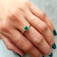 Gold Ring set with Diamonds and Emerald , engagement ring, Gold ring, Natural stone, Birthstone ring, Gemstone ring, Solid 14k, Promise ring. This handmade Gold ring with Diamonds and Emerald is made of 14K genuine gold and set with one Natural stone. This Stunning Ring is High end finish. This 14k Gold ring with green stone can serve as an Birthstone ring or a birthday gift. Stone size is 4/5 mm octagon cut Emeralds are known to heal both emotional love and the physical heart. It is a powerful 14k Gold Emerald Cut Ring With Prong Setting, Princess Cut Diamond Emerald Ring For Promise, Princess Cut Emerald And Diamond Promise Ring, Emerald Solitaire Ring For Promise, 14k Gold Emerald Ring Princess Cut, Baguette Cut Emerald Ring With Center Stone For Promise, Emerald Cut Ring With Prong Setting For Promise, Emerald Cut Prong Setting Promise Ring, Luxury Emerald Solitaire Ring