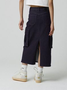 This is a comfortable and trendy skirt by MAGOODGAN that is made out of high quality cotton blend fabric. With unique design detail with trendy look, it will stand out from your casual and young daily outfit.- Rinse washed non fade denim fabric- Big pockets detail on the side- Elastic waistband- Deep vent on the back Dark Wash Cotton Mini Skirt, Dark Wash Cotton Denim Mini Skirt, Trendy Dark Wash Skirt With Pockets, Utility Style Cotton Mini Cargo Skirt, Utility Style Cotton Cargo Mini Skirt, Utility Cotton Skirt For Fall, Fall Utility Cotton Skirt, Day Out Cotton Midi Skirt, Utility Cotton Skirt With Pockets