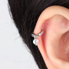 A true eye-catching dazzler, this sparkling round drop hoop is ideal to wear alone or matching with our studs, hoops for a cohesive look. With a flesh set of cubic zirconia sparkling gems, it is the touch of luxury you've been looking for to add to your everyday look! Detail： -Material: stainless steel -Used in healed piercings. -Tarnish proof and durable so you can wear it everyday without worry! Quantity & Measurement：-Gauge: 20g-Diameter: 5mm | 0.20"-Include: 1*Cozy-Comfortable to wear, hypoa Packing Jewelry, Helix Earrings, Jewelry Gift Box, Free Jewelry, Jewelry Branding, You've Been, Everyday Look, Piercings, Gift Set