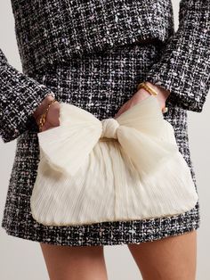 Loeffler Randall's 'Rayne' clutch is a glamorous option for occasions when you just need the essentials. It's made from white plissé-organza and topped with an artful bow. Secure your phone, cards and compact inside, attaching the chain strap to go hands-free. Elegant Spring Wedding Bags, Elegant Wedding Bags For Spring, White Wedding Bags For Spring, Designer Clutch For Cocktail Events, Spring Event Clutch Evening Bag, Elegant Evening Bag For Spring, Elegant Bags With Bow For Events, Elegant White Clutch For Events, Chic Bags For Gala