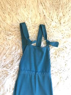 These jumpsuits are soo stinking cute! I can't... I mean, look at them!! 💕 What a perfect little outfit; simple, easy yet a statement maker! Adjustable shoulder straps ensure you get a perfect fit that will grow with your little for awhile. And who doesn't love that! Pink Stripe is being restocked and will ship approximately February 1st. Blue will ship today! These are Razels brand! 😍 2-3t Measures 26 1/2" from top chest to bottom hem, 8 1/2" across waist. 3-4t measures 29" from top of front Trendy Blue Cotton Shortalls, Spring Blue Denim Jumpsuit With Suspenders, Blue Overalls With Suspenders For Summer, Casual Blue Stretch Overalls, Playful Fitted Blue Jumpsuits And Rompers, Cute Blue Overalls For Playwear, Cute Blue Bib Front Overalls, Blue Overalls For Playtime In Spring, Blue Shortalls With Suspenders