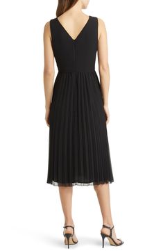 Designed in a sleeveless silhouette, this day-to-night dress is punctuated with a pleated chiffon skirt. 46" length (size 8) V-neck Sleeveless Lined 100% polyester Dry clean Imported Black Sleeveless Dress With Accordion Pleats, Sleeveless Pleated Back Dress For Formal, Sleeveless Dress With Accordion Pleats For Evening, Black Pleated Skirt Dress For Evening, Sleeveless Dresses With Pleated Back For Formal Events, Fitted Sleeveless Pleated Evening Dress, Sleeveless Evening Dress With Accordion Pleats, Black Pleated Dress With Accordion Pleats For Evening, Black Evening Pleated Dress With Pleated Skirt