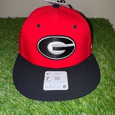 Nike Uga Dawgs Georgia Bulldogs Baseball Team Issued Fitted Cap Hat Red Nike Adjustable Hat For Fan Gear, Nike Snapback Hats For Sports Events, Nike Adjustable Snapback Hat, Nike Flat Bill Hat For Sports Events, Nike Adjustable Snapback Hat With Flat Bill, Nike Adjustable Flat Bill Snapback Hat, Nike Snapback Baseball Cap, Nike Adjustable Flat Bill Baseball Cap, University Red Casual Snapback Hat