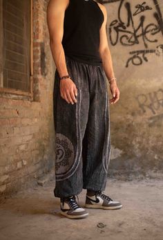 Elevate Your Festival Wardrobe with These Stunning Unisex Stonewashed Baggy Spiritual Pants! Designed for ultimate comfort and style, these unisex stonewashed baggy pants are the perfect addition to your festival wardrobe and everyday look. Crafted from sustainable, eco-friendly cotton, these trousers are ideal for those who value both fashion and the environment. Whether you're dancing at a festival, flowing through yoga, or simply embracing your free-spirited lifestyle, these pants will keep y Full-length Cotton Harem Pants For Streetwear, Full Length Cotton Harem Pants For Streetwear, Cotton Full Length Harem Pants For Streetwear, Relaxed Fit Comfortable Cotton Bottoms, Comfortable Relaxed Fit Cotton Bottoms, Summer Cotton Relaxed Fit Harem Pants, Summer Relaxed Fit Cotton Harem Pants, Loosely Fitted Cotton Harem Pants, Spring Festival Cotton Pants