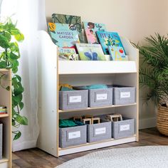 the bookshelf is filled with children's books and other things to read