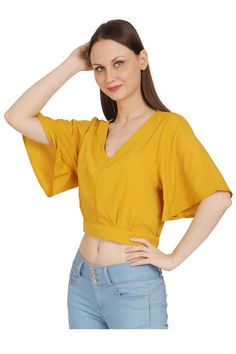 • Radiate positivity with this vibrant top.• Add a pop of sunshine to your wardrobe.• Breezy and lightweight for ultimate comfort. Casual Cotton V-neck Top For Summer, Trendy V-neck Top For Vacation, Summer Cotton V-neck Top For Day Out, V-neck Cotton Top For Summer, Cotton V-neck Summer Top, Casual Yellow V-neck Top, Trendy V-neck Relaxed Fit Blouse, Trendy V-neck Vacation Tops, Spring V-neck Top For Day Out