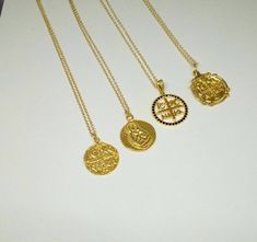 A nice 14k gold filled necklace with an eye catching Christian Pendant. A dainty everyday charm that brings good luck and protects the person that is wearing it. A nice gift for her Length approx. 16 inches / 40.5 ♥ All items will come in a nice gift box ♥ ★ Read our policies before purchase: https://www.etsy.com/shop/Jewellusion/policy/ ★ Convo me for custom orders or any questions you might have ♥ Visit our shop for more fabulous jewels: https://www.etsy.com/shop/Jewellusion/ ♥ Follow me on Pi Plated Medallion Jewelry Gift, Medallion Shaped Plated Jewelry Gift, Handmade Byzantine Sterling Silver Necklace, Byzantine Necklace With Coin Pendant For Gift, Byzantine Necklace With Coin Pendant As Gift, Silver Gold Plated Coin Necklace For Gift, Byzantine Style Coin Necklace For Gift, Byzantine Round Pendant Necklace For Gift, Byzantine Sterling Silver Pendant Necklace