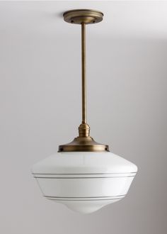 a white light hanging from a ceiling fixture