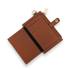 Our cognac mini leather wallet is functional and stylish. Zippered coin pouch 6 card slots 3 slip pockets Ring to attach keys or lanyard Size: 5.5"w x 3.5"h Materials: faux leather Care Instructions: Wipe with Damp Cloth Vendor: Demdaco Mini Wallet, Coin Pouch, Leather Care, Leather Goods, Cognac, Lanyard, Leather Wallet, Card Slots, Slots