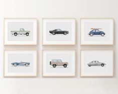 six framed cars are hanging on the wall in front of a white chair and table