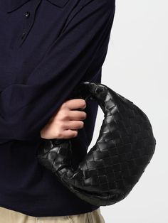 Mini Bag BOTTEGA VENETA Woman color Black Designer Black Handheld Baguette Bag, Luxury Black Handheld Baguette Bag, Designer Black Pouch Baguette Bag, Designer Black Baguette Pouch Bag, Luxury Handheld Pouch For Shopping, Luxury Handheld Shopping Pouch, Designer Handheld Baguette Bag, High-end Pouch Shoulder Bag With Handles, Designer Handheld Baguette Bag With Top Carry Handle