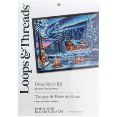 the cross stitch kit features a winter scene