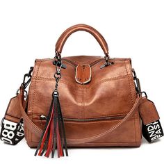 Brown Large Capacity Shoulder Bag As Fashion Accessory, Trendy Fall Season Bags, Trendy Fall Fashion Accessory Bags, Trendy Shoulder Bag With Tassels, Leather Bags With Zipper Closure, Crossbody Satchel With Zipper Closure, Crossbody Satchel With Zipper Closure As Fashion Accessory, Fashion Accessory Crossbody Satchel With Zipper Closure, Trendy Tassel Satchel Shoulder Bag