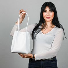 ● This bag model is simply the best solution for a modern woman. Its shape is perfect, the size is very roomy and you can get both comfort and a beautiful minimalist design in one bag. The quality of genuine leather for bags is very high, the bag keeps its shape perfectly. We also offer several size options for your most necessary daily items: phone, gadgets, cosmetic bag, wallet, notepad ● ● On top between the handles of the bag is the logo of the store. It can be a place for your personalizati Minimalist Square Shoulder Bag For Shopping, Minimalist Satchel Shoulder Bag For Shopping, Minimalist Shoulder Bag With Removable Pouch For Shopping, Minimalist Shoulder Bag With Removable Pouch, Minimalist Satchel Shopping Bags, Minimalist Shopping Satchel Bag, Everyday Square Soft Leather Bag, Minimalist White Office Bag, Minimalist Square Hobo Bag For Everyday Use