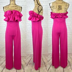 New - Strapless Hot Pink Jumpsuit Has A Ruffled Detail Around The Top With Anti-Slip Strip On The Upper Inside, Back Zipper & Wide Legs. Some Stretch. Cute * Size Large * Bust Up To 36/38” * Length 55” * Inseam 32” * Polyester 1258 Spring Strapless Jumpsuit For Night Out, Spring Strapless Jumpsuit For Evening, Strapless Jumpsuit For Spring Evening, Strapless Jumpsuit For Date Night In Summer, Elegant Pink Strapless Jumpsuit For Summer, Bandeau Strapless Jumpsuit For Spring Evening, Strapless Stretch Jumpsuit For Date Night, Spring Evening Bandeau Strapless Jumpsuit, Spring Evening Strapless Bandeau Jumpsuit