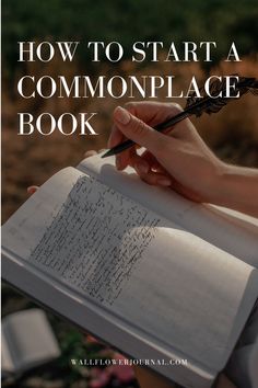 someone writing on a book with the title how to start a communplace book