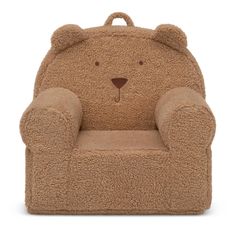 a brown teddy bear chair sitting on top of a white floor