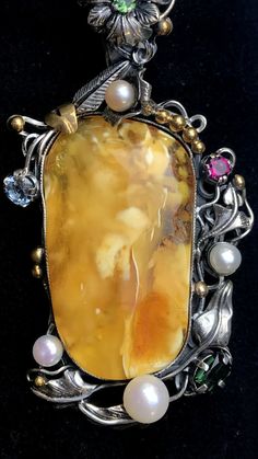 "ARTISAN AMBER GEMSTONE PENDANT Hand-made Sterling Silver 925. 24k Gold Stones used: Butterscotch Baltic Amber Pink&Green Tourmaline, Pearls Height - 2 3/4' (with bail), Width - 1 3/8' Height -70mm (with bail), Width - 35mm Unique Handcrafted One-of a-kind Design Pendant Each Piece of Jewelry in my Collection is Absolutely One of a Kind! When you start wearing a piece of my jewelry you will fall in love with it more and more each day and feel that good Energy and Love that I pass into it whi Unique Polished Gemstones For Formal Occasions, Unique Formal Gemstones With Polished Finish, Heirloom Pendant Jewelry Collectible, Vintage Gold Gemstones For Gifts, Artisan Cabochon Jewelry For Formal Occasions, Handmade Pendant Brooch For Formal Occasions, Unique Formal Polished Gemstones, Heirloom Jewelry With Large Pendant For Collectors, Collectible Heirloom Jewelry With Large Pendant