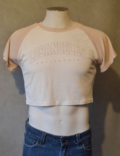 This adorable cropped Los Angeles top  is great for any outfit.  small Casual Stretch Cropped T-shirt, Pink Cropped T-shirt For Spring, Casual Pink Crew Neck Cropped Shirt, Cute Short Sleeve Crop Top For Spring, Spring Stretch Crop Top With Letter Print, Spring Letter Print Stretch Crop Top, Pink Cropped Graphic Tee Crop Top, Casual Pink Crop Top With Letter Print, Cute Short Sleeve Summer Crop Top